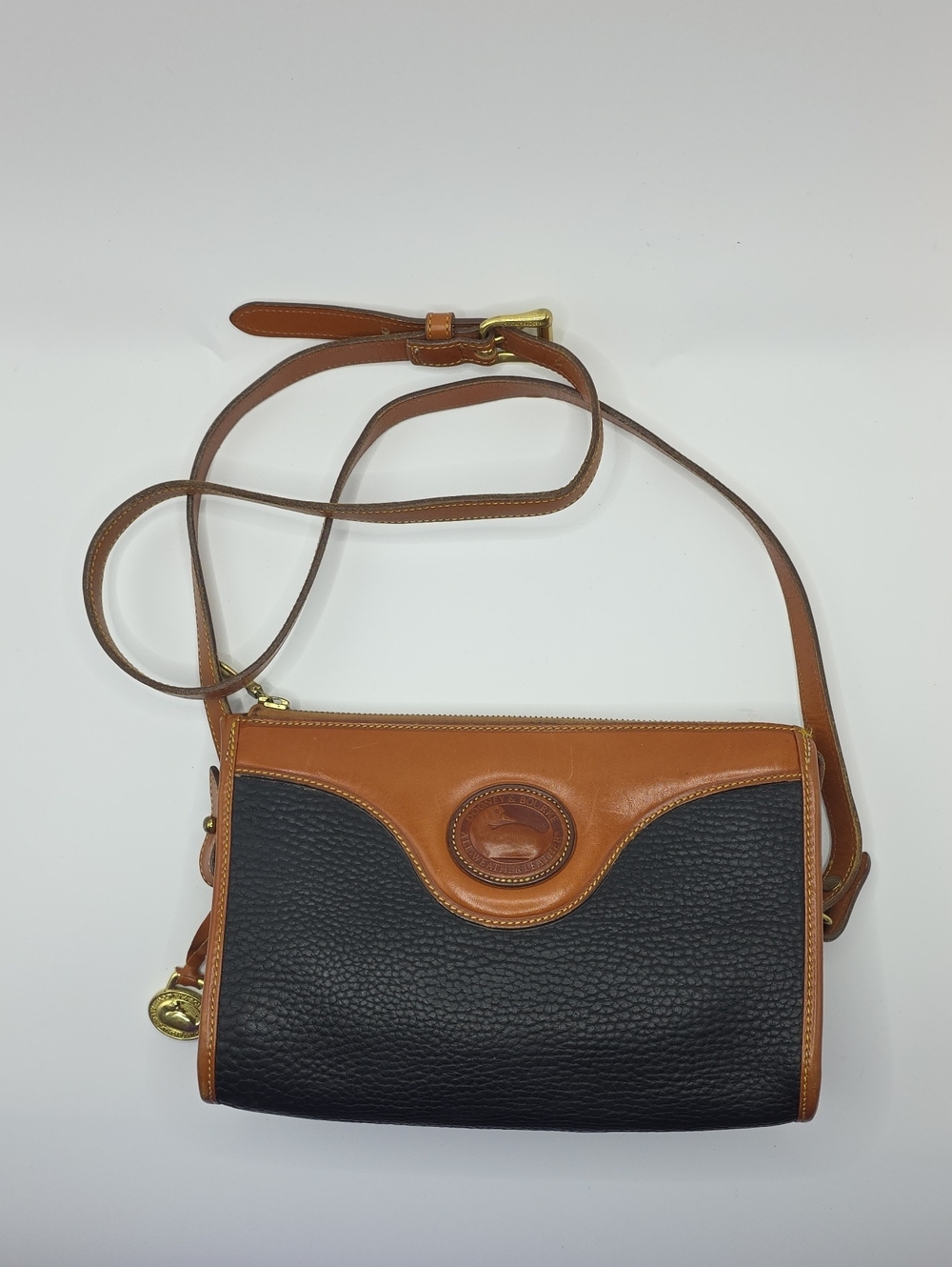 Dooney & Bourke All Weather Leather Black and Brown Pebbled Crossbody